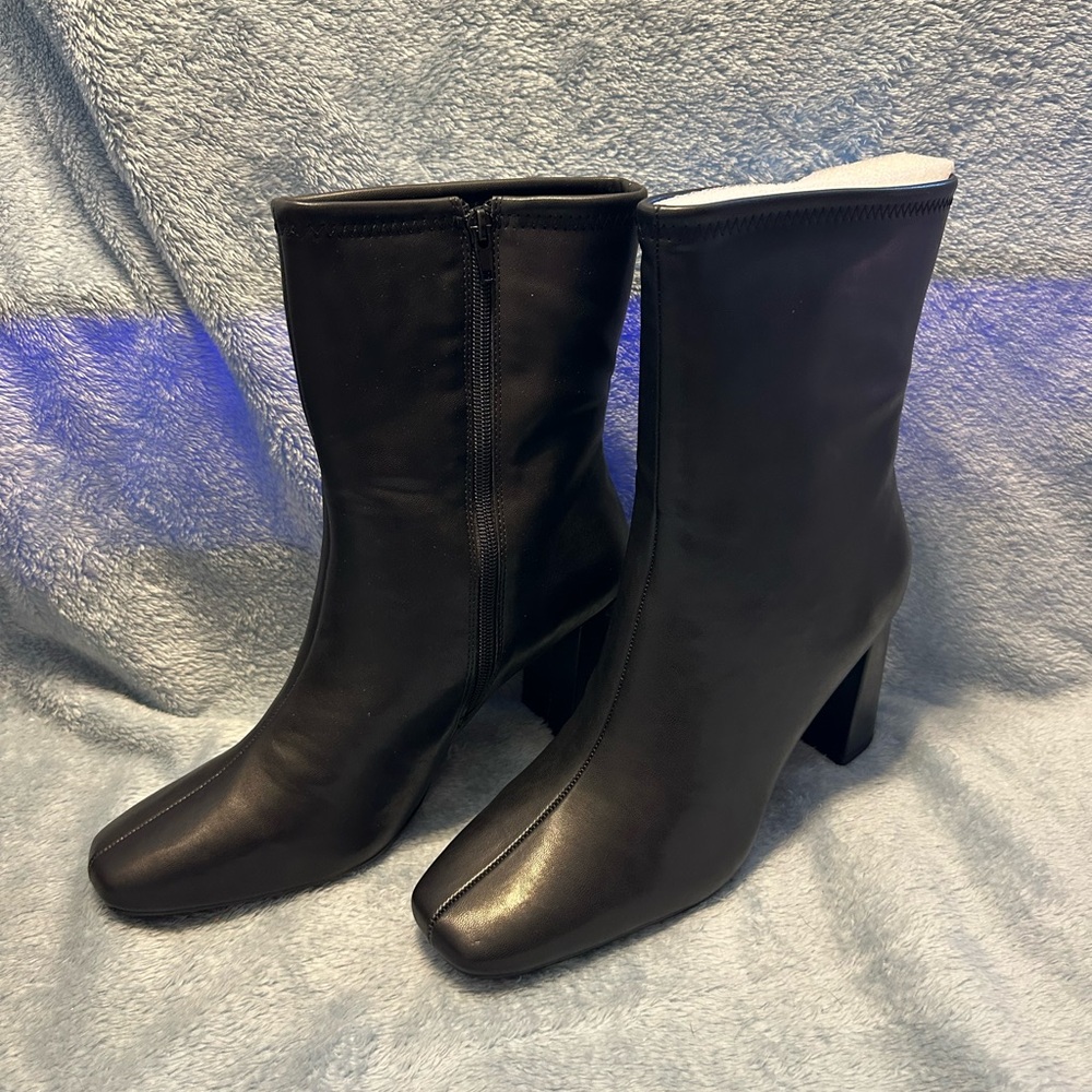 Sleek Black Heeled Boots
